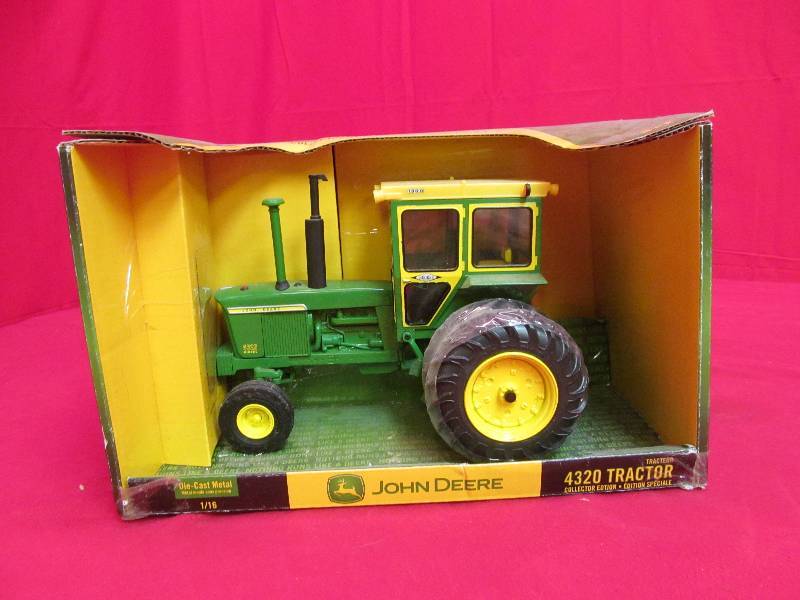 lot 16 image: collectable John Deere tractor