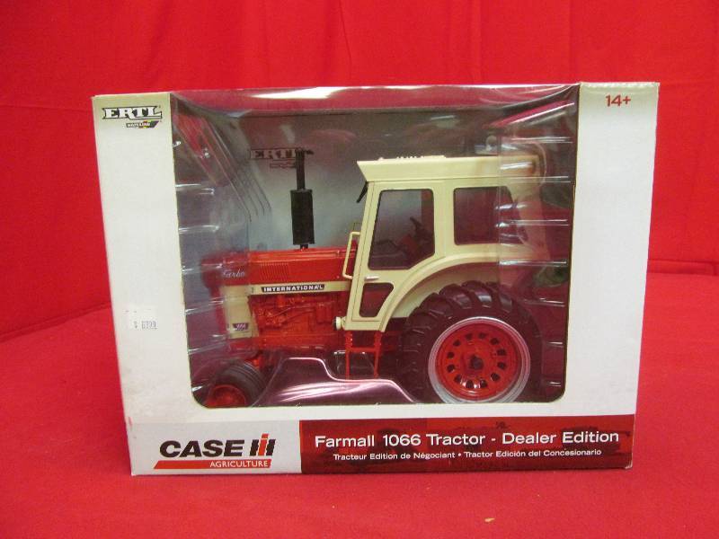 lot 24 image: Collectable Farmall tractor