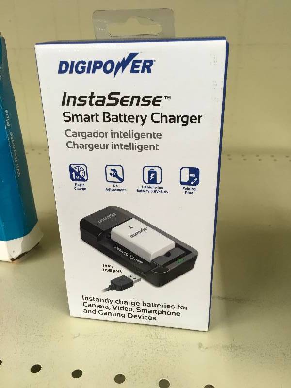 lot 555 image: Digipower InstaSense Smart Battery Charger, Retail $10.00