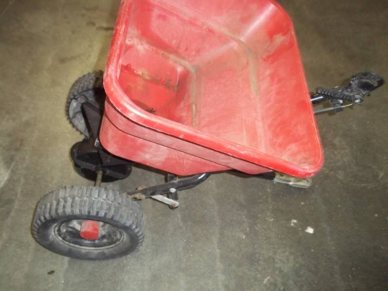 lot 32 image: Red Fertilizer Spreader