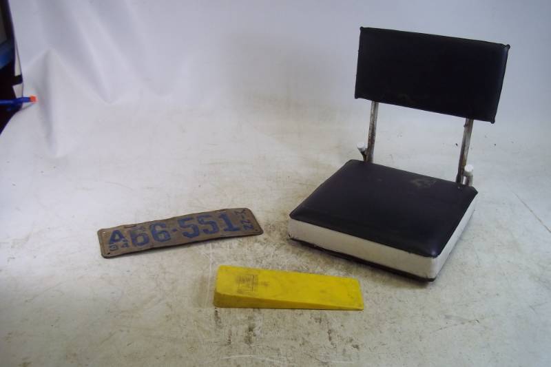 lot 112 image: 1934 License Plate, Chainsaw Cutting Wedge, Stadium Seat