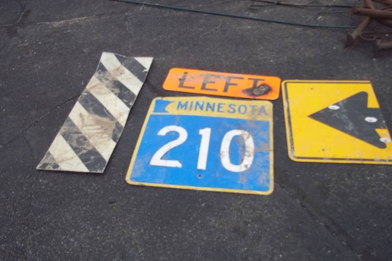 lot 122 image: 4 Aluminum Signs. MN 210, Left, etc.