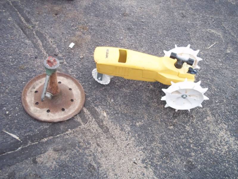 lot 148 image: 2 Vintage Lawn Water Sprinklers