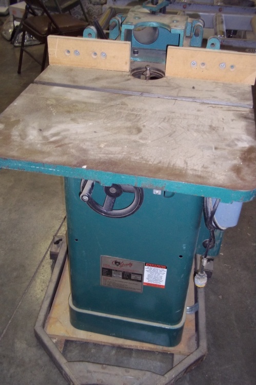 lot 160 image: Grizzly Brand G1035 34 Wood Shaper with Rolling Cart.