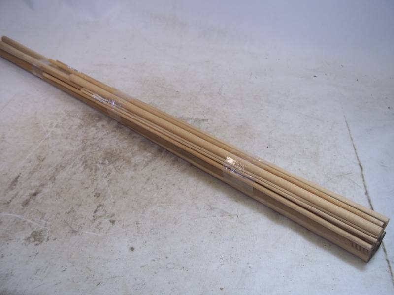 lot 202 image: Assorted Wood Dowels. 14 pcs.