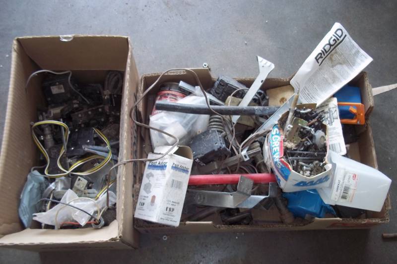 lot 216 image: Assorted Lot of Circuit Breakers, Joist Hangers, and Misc. Hardware.