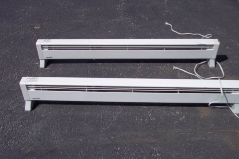 lot 267 image: 2 Electric Plug In Baseboard Style Heaters