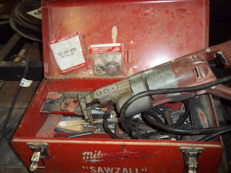 lot 325 image: Milwaukee Sawzall with Metal Box, Blades & Rebuild Parts