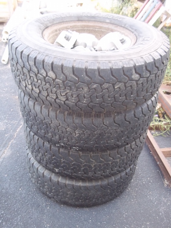 lot 331 image: Set of 4 Tires & Wheels For Chevy. 24575R16