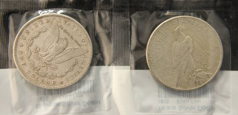 2 SILVER DOLLARS 1879XF & 1925 XF BOTH SEALED IN ORIGINAL LITTLETON PKG