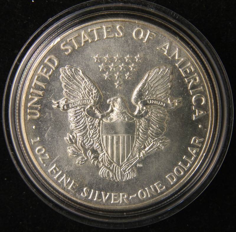 1987 AMERICAN SILVER EAGLE 1 TROY OZ. .999 FINE SILVER IN AIRTITE