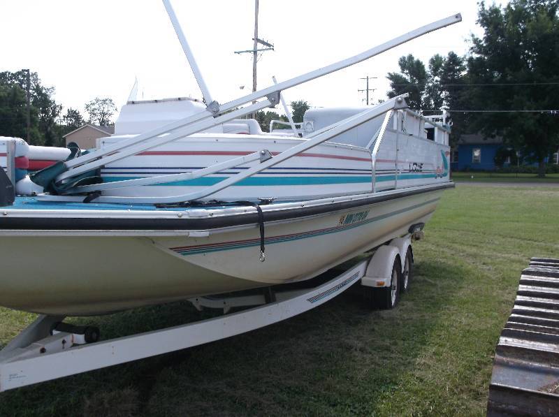 1996 24 LOWE DECK BOAT, MOTOR AND 1995 TRAILER