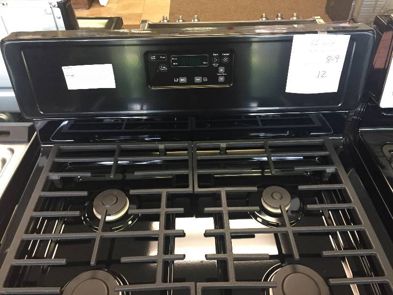 NEW Scratch & dent WHIRLPOOL, 5.1 cu. ft. Gas Range in Black, WITH MANUFACTURERS WARRANTY Model# WFG320M0BB