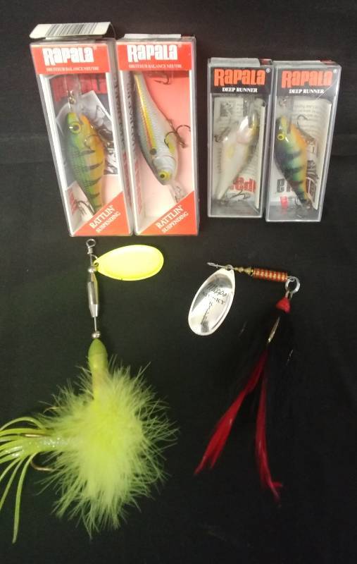 lot 11 image: 4 Rapala Rattling jigs  2 spoons