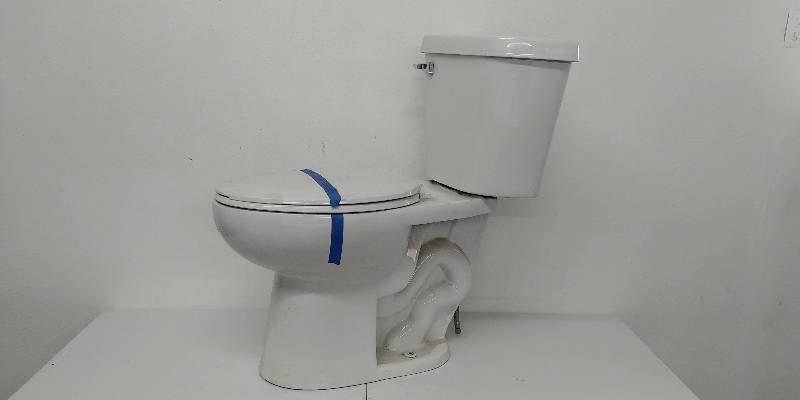 lot 46 image: White Elongated Bowl Toilet