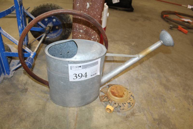 lot 394 image: Water Can, Yard Sprinkler