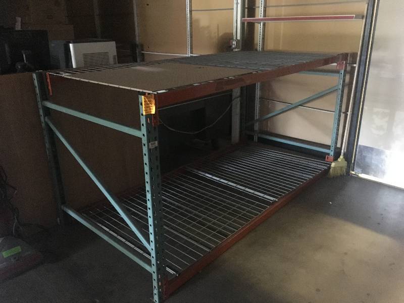 lot 12 image: ALL ORANGE SHELVING  IN BACK WAREHOUSE BACK LEFT AND TOWARD THE FRONT -  ALL 1 LOT ALL SOLD TOGETHER