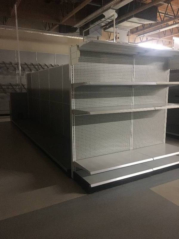 lot 25 image: LONG RUN OF MADIX BRAND LOZIER  GONDOLA RETAIL SHELVING APPROX 25 RUN 36 DEEP - 7 TO 9 TALL ALL MEASUREMENTS ARE APPROXIMATE