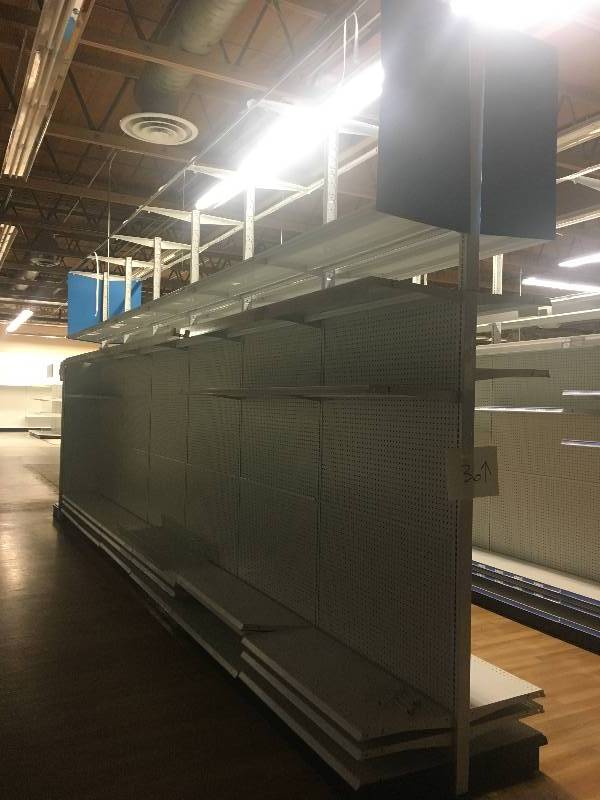 lot 36 image: LONG RUN OF MADIX BRAND LOZIER  GONDOLA RETAIL SHELVING APPROX 70 RUN 36 DEEP - 7 TO 9 TALL ALL MEASUREMENTS ARE APPROXIMATE