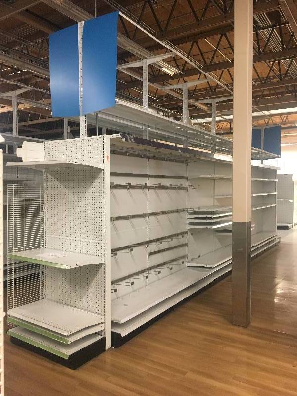 lot 38 image: LONG RUN OF MADIX BRAND LOZIER  GONDOLA RETAIL SHELVING APPROX 30 RUN 36 DEEP - 7 TO 9 TALL ALL MEASUREMENTS ARE APPROXIMATE