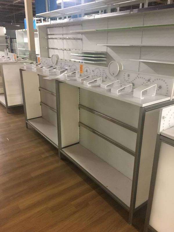 lot 39 image: LONG RUN OF MADIX BRAND LOZIER  GONDOLA RETAIL SHELVING APPROX 100 RUN 36 DEEP - 7 TO 9 TALL ALL MEASUREMENTS ARE APPROXIMATE