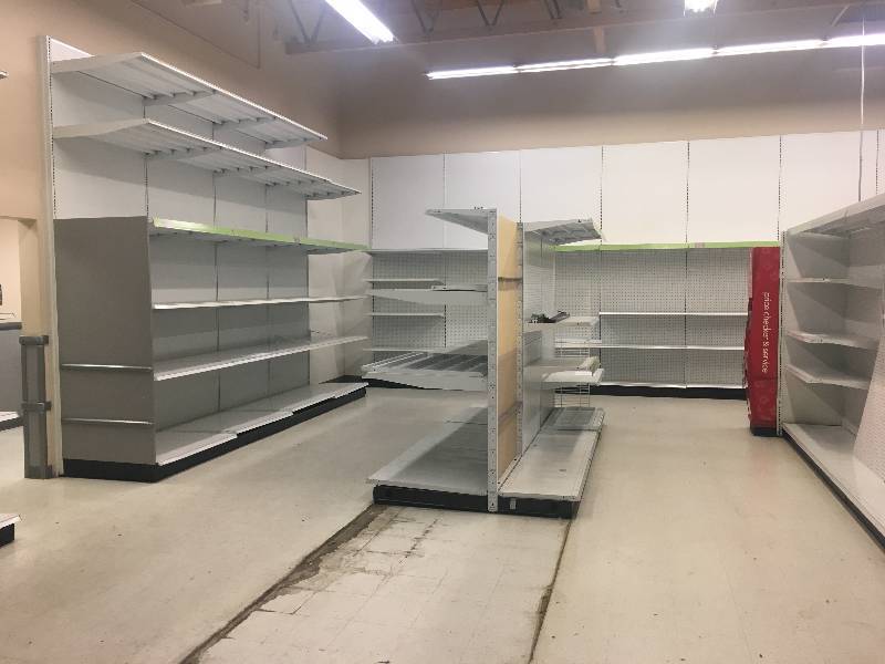 lot 40 image: LONG RUN OF MADIX BRAND LOZIER  GONDOLA RETAIL SHELVING APPROX 140 RUN 36 DEEP - 7 TO 9 TALL ALL MEASUREMENTS ARE APPROXIMATE     BRING HELP - BRING HELP PLEASE BRING HELP O YEA BRING HELP AND TOOLS
