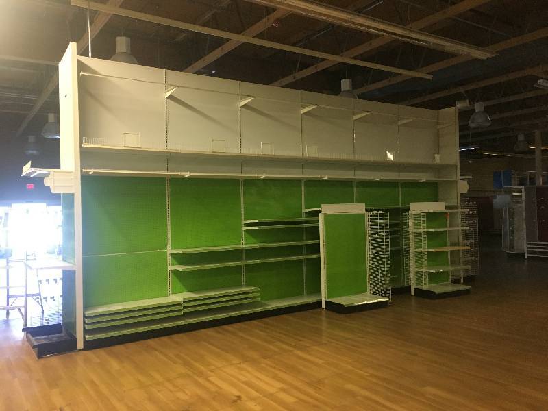 lot 52 image: LONG RUN OF MADIX BRAND LOZIER  GONDOLA RETAIL SHELVING APPROX 130 RUN 36 DEEP - 7 TO 9 TALL ALL MEASUREMENTS ARE APPROXIMATE