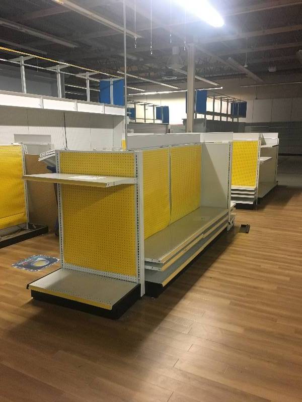 lot 55 image: LONG RUN OF MADIX BRAND LOZIER  GONDOLA RETAIL SHELVING APPROX 225 RUN 36 DEEP - 7 TO 9 TALL ALL MEASUREMENTS ARE APPROXIMATE