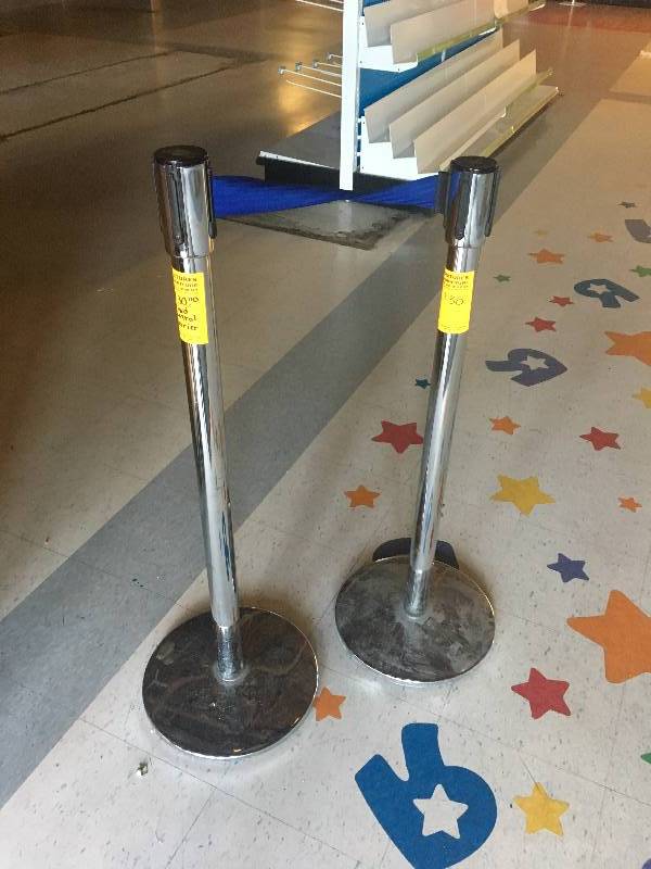 lot 70 image: LOT OF MISC ITEMS - BROOMS  - EXTENSION CORDS - CROWD BARRIER - FLOOR MATS - RETAIL BASKETS - AND CHAIR