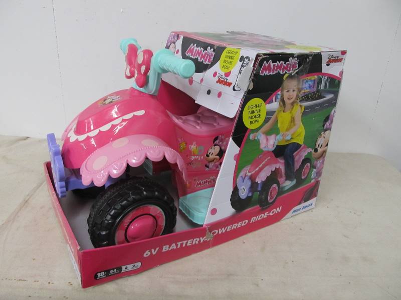lot 23 image: Minnie Mouse Childs Ride-On Toy Car