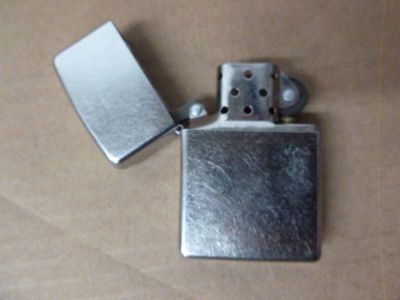 lot 147 image: Zippo Lighter