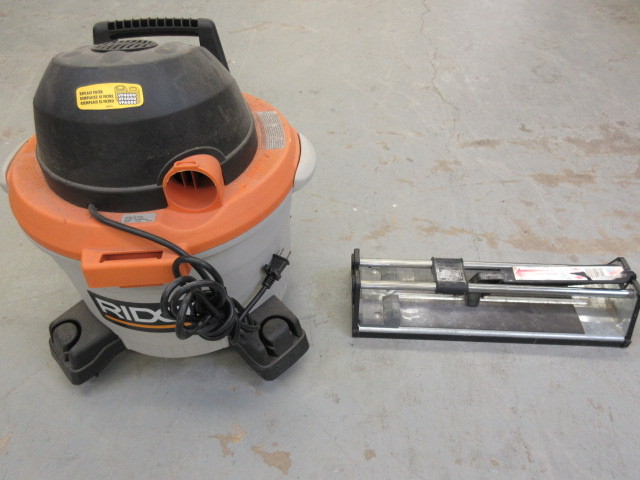 lot 618 image: RIGID 6 GALLON DRYWET VAC & TILE CUTTER