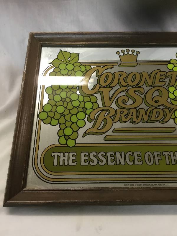 lot 3 image: Antique Cornet VSQ Brandy Mirror