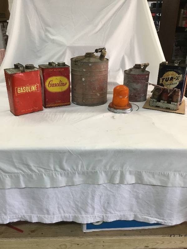 lot 36 image: Old Metal gas cans, metal mop bucket, 3 oil cans and  service light