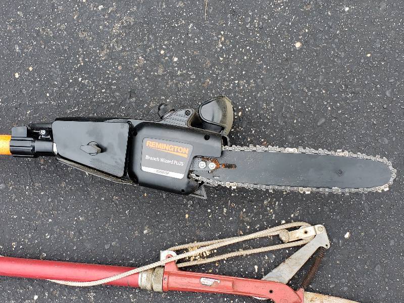 lot 15 image: Electric Remington Branch Wizard Plus, and Manual Pruner