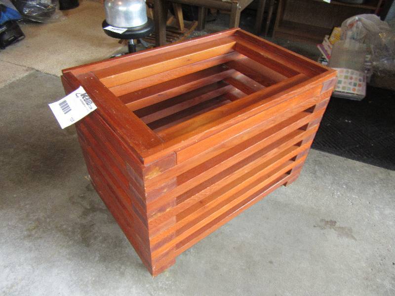 lot 125 image: Slotted Wooden Table