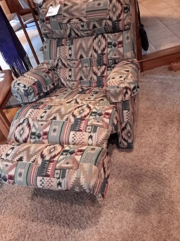lot 12 image: Reclining and Swiveling Cloth Chair