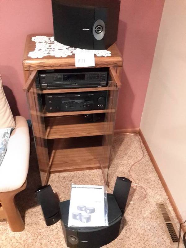 lot 17 image: Upright Media Cabinet with Technics CD Changer, Yamaha Reciever, 4 Bose Speakers, and Vintage Over Ear Headphones