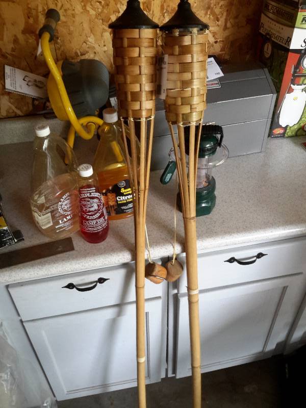lot 208 image: 2 Tiki Tourches with Fuel, 1 Cabelas Electric Lantern