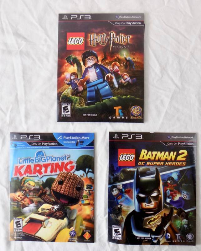 lot 31 image: Collection of 5 Items (3) Unopened PS3 Kids Games  (new) Green Bay Packer 6 Dog Leash  (new) 3 x 5 American Flag & Pole Set