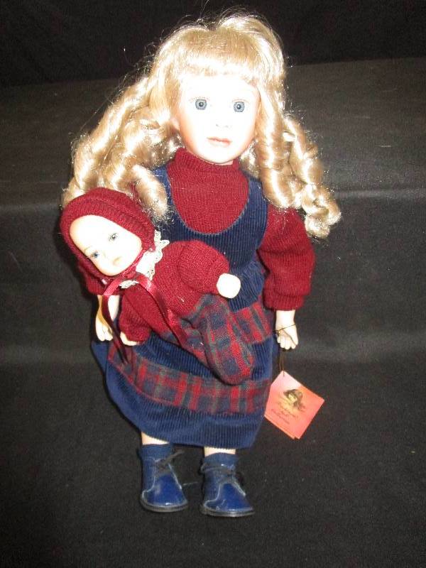 lot 165 image: Traditions Doll Collection Porcelain Doll 16 Tall Holding Porcelain Baby
