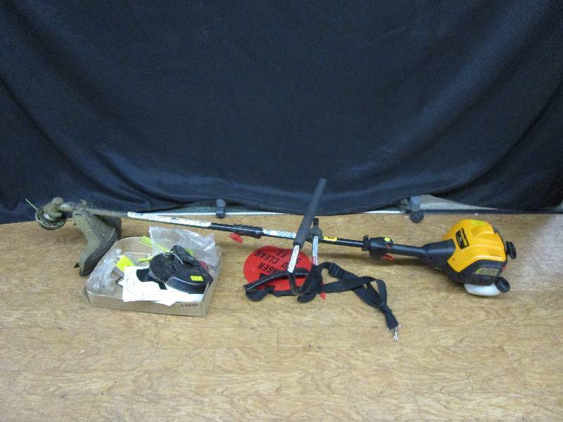 lot 81 image: Poulan Gas Weedeater and the extra end with saw blade and extra weedeater.