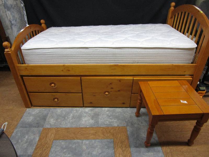 lot 82 image: Twin bed with matress and storage drawers underneath