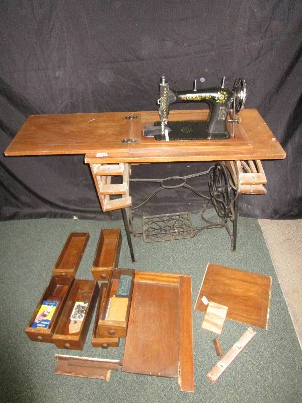 lot 147 image: Old Antique Sewing Machine with Trendle, Franklin Rotary Serial no. 29X395, Lots of Extra Pieces and Attachments