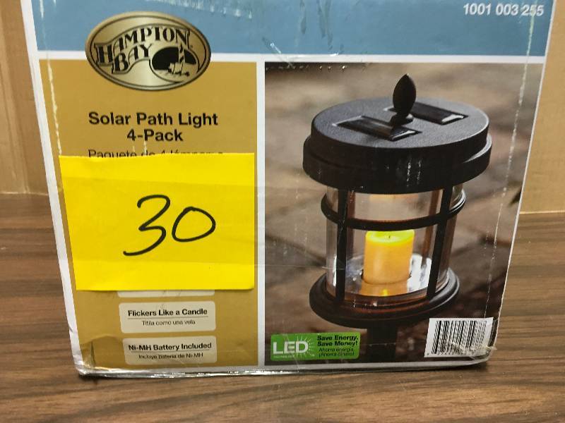 lot 30 image: Hampton Bay Solar Black Outdoor Integrated LED Cast Aluminum Landscape Path Light with Clear Glass and Flickering Candle (4-Pack) new