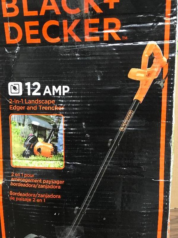 lot 39 image: Black & Decker 7.5 in. 12-Amp Corded Electric 2-in-1 Landscape EdgerTrencher  Used in good working cond.