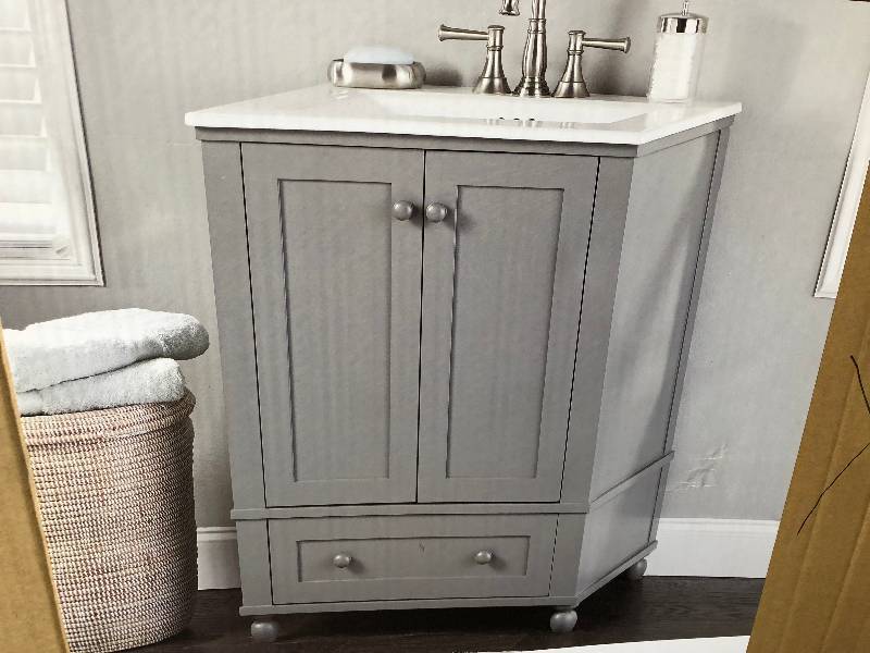 lot 107 image: Home Decorators Collection Inman 24.5 in. W x 22 in. D x 34.24 in. H Vanity in Cool Gray with Vitreous China Vanity Top in White open box not used