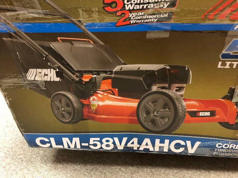 lot 118 image: Echo 21 in. 58-Volt Brushless Lithium-Ion Battery Walk Behind Push Lawn Mower - Two 4.0 Ah BatteriesCharger Included in working conditions
