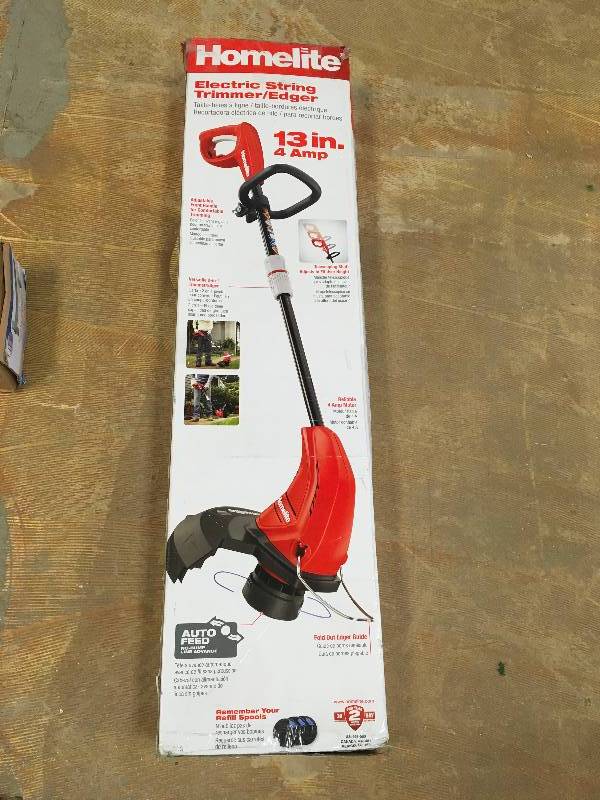 lot 7 image: Set of 2 Homelite 13 in. 4 Amp Straight Electric String Trimmer in working conditions