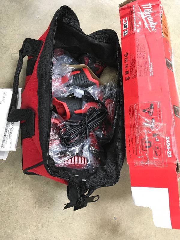 lot 26 image: Milwaukee M12 12-Volt Lithium-Ion Cordless Drill DriverImpact Driver Combo Kit (2-Tool) w(2) 1.5Ah Batteries, Charger, Tool Bag in good conditions